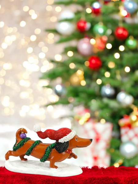 Dackel mit Weihnachtsgirlande